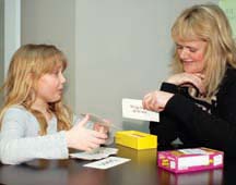 UNDER TUTELAGE: Noeleen Owton works with Aoife at Westwind Learning Center.